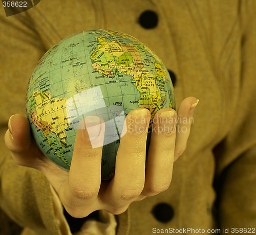 Image of Globe in a girl's hands