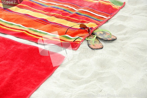 Image of Beach towels on sand