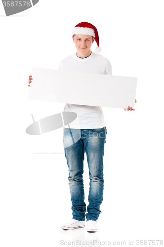 Image of Young man in Santa hat