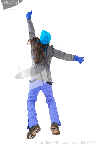 Image of Winter woman jumping