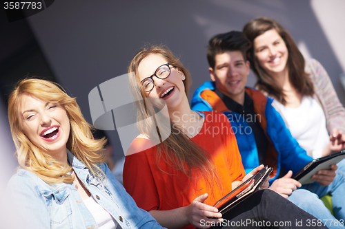 Image of students group working on school  project  together