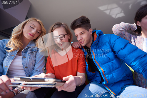 Image of students group working on school  project  together