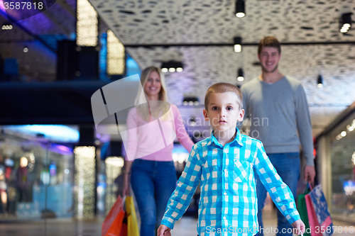 Image of young family with shopping bags