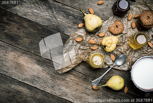 Image of pears Cookies honey and nuts on rustic wood