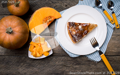 Image of Lunch piece of pie Pumpkin slices in Rustic style
