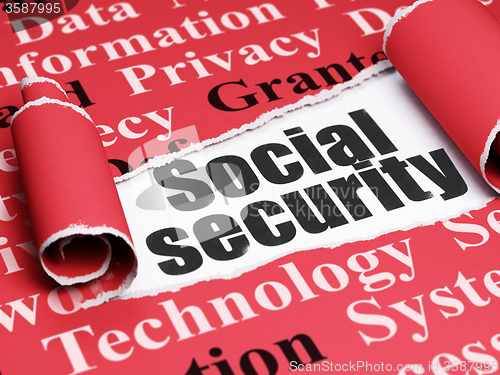 Image of Security concept: black text Social Security under the piece of  torn paper
