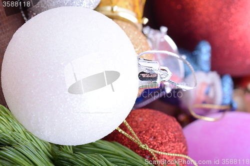 Image of Closeup of beautiful Christmas baubles, Decorated christmas tree, holiday background, green tree eve branch close up with christmas balls 