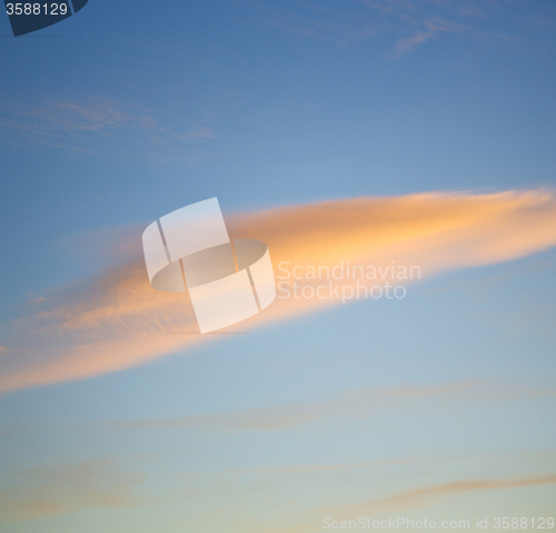 Image of sunrise in the colored sky white soft clouds and abstract backgr