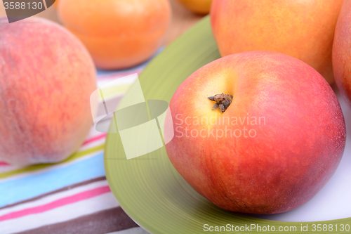 Image of many different fruits for the health of the entire family, peach, mandarin, apple