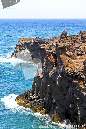 Image of hervideros brown rock in   water   summer 