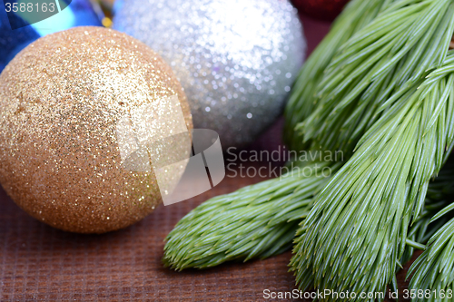 Image of Decorated christmas tree - holiday background, green tree eve branch close up with christmas balls 
