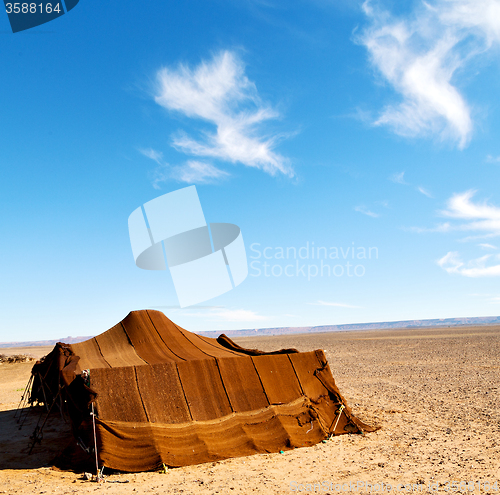 Image of tent in  the desert of morocco sahara and rock  stone    sky