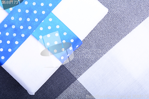 Image of White gift box with blue ribbon