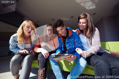 Image of students group working on school  project  together