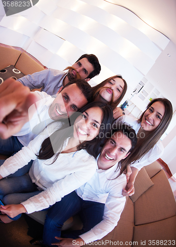 Image of group of friends taking selfie