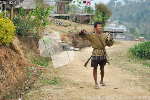 Image of Man with rifle in Nagaland, India