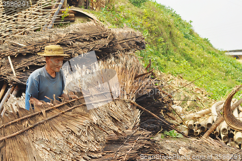 Image of Older man working in Nagaland, India