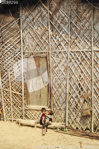 Image of Small kids in front of house in Nagaland, India