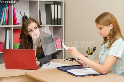 Image of Office Specialist tensely looks at a client to dig in securities
