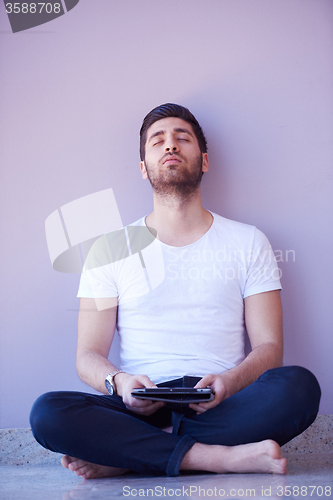 Image of student working on tablet