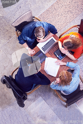 Image of students group working on school  project  together