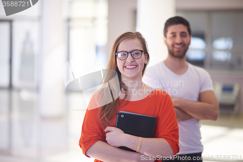 Image of students couple standing together