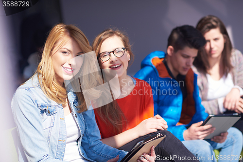 Image of students group working on school  project  together