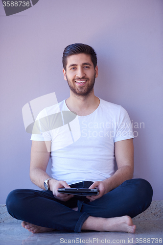 Image of student working on tablet