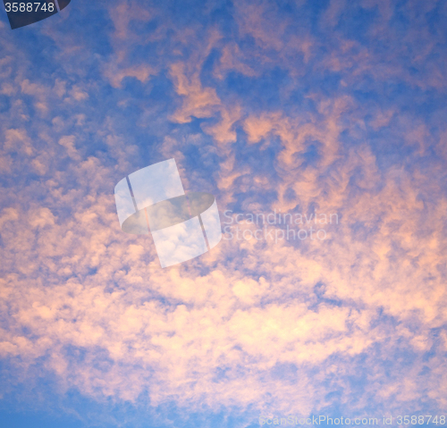 Image of sunrise in the colored sky white soft clouds and abstract backgr