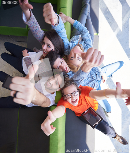 Image of students group working on school  project  together
