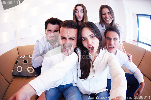 Image of group of friends taking selfie
