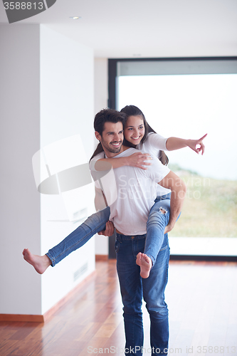 Image of happy young romantic couple have fun and  relax at home