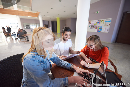 Image of students group working on school  project  together
