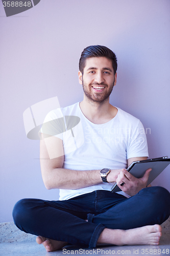 Image of student working on tablet