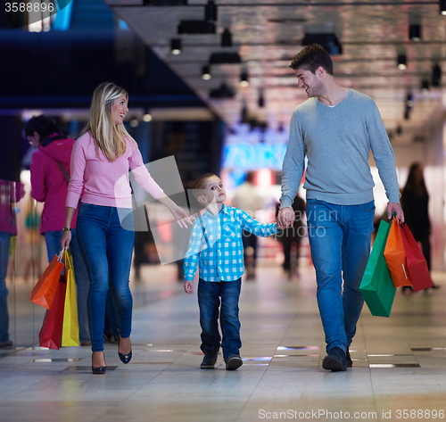 Image of young family with shopping bags