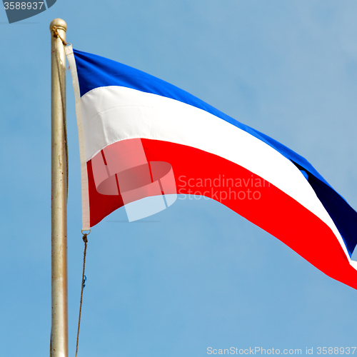 Image of french waving flag in the blue sky  france  colour and wave
