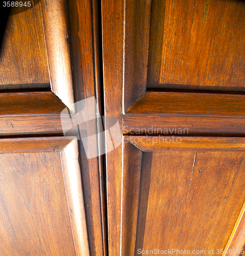 Image of  mozzate rusty brass brown knocker   door curch  closed metal wo