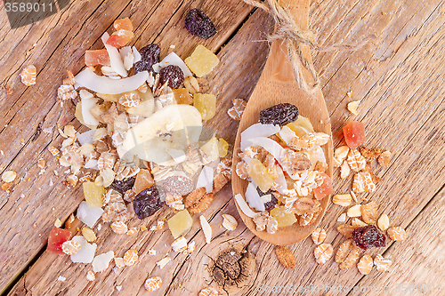 Image of cereals muesli food in wooden spoon