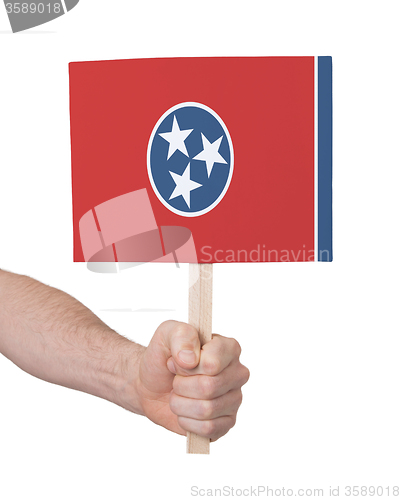 Image of Hand holding small card - Flag of Tennessee