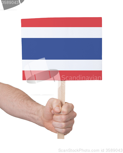 Image of Hand holding small card - Flag of Thailand