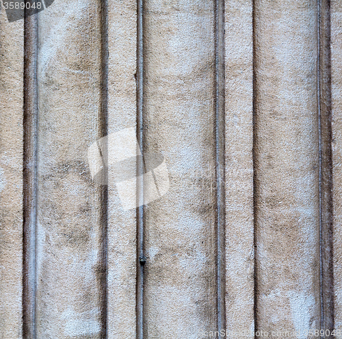 Image of in london abstract    texture of a ancien wall and ruined brick