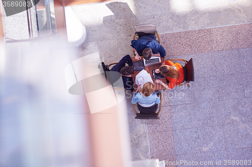 Image of students group working on school  project  together