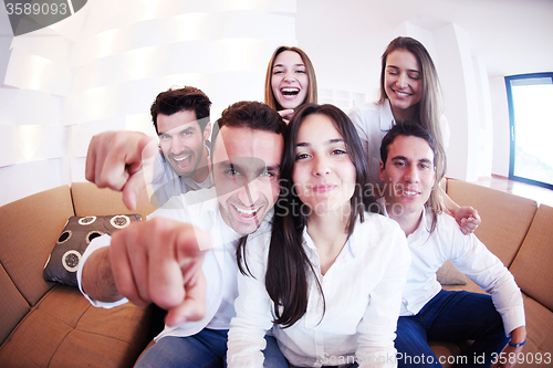 Image of group of friends taking selfie
