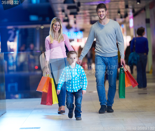 Image of young family with shopping bags