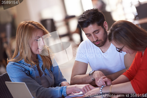 Image of students group working on school  project  together