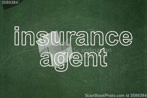 Image of Insurance concept: Insurance Agent on chalkboard background