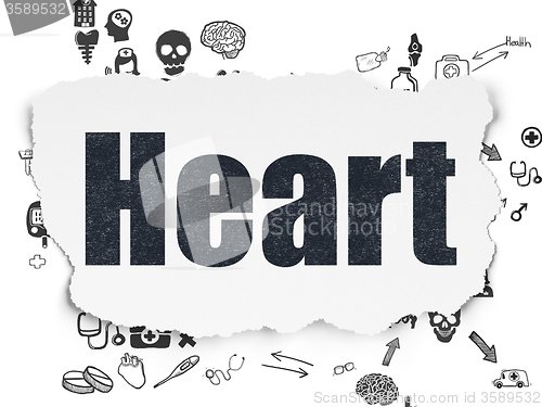 Image of Medicine concept: Heart on Torn Paper background