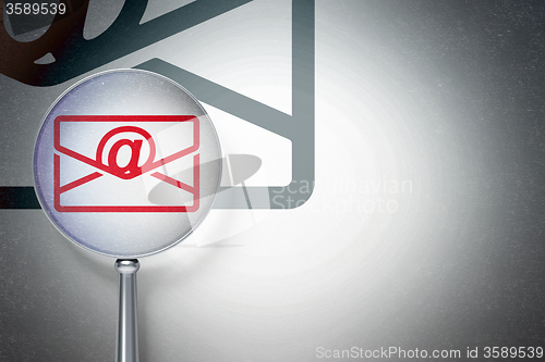 Image of Business concept:  Email with optical glass on digital background