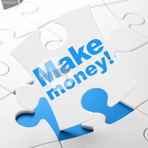 Image of Business concept: Make Money! on puzzle background