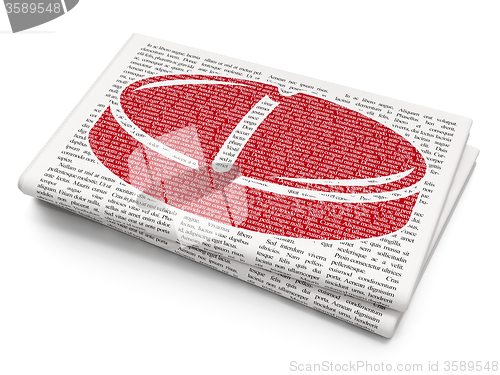 Image of Medicine concept: Pill on Newspaper background